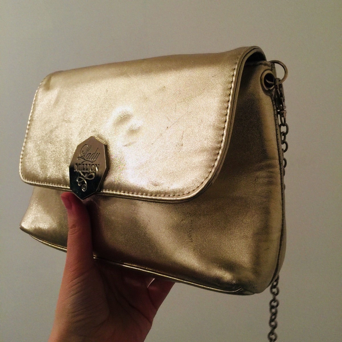Paco Rabanne gold bag