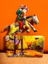 Vintage German Tin Cowboy Clicker Toy Lithographed Horse Western Noisemaker