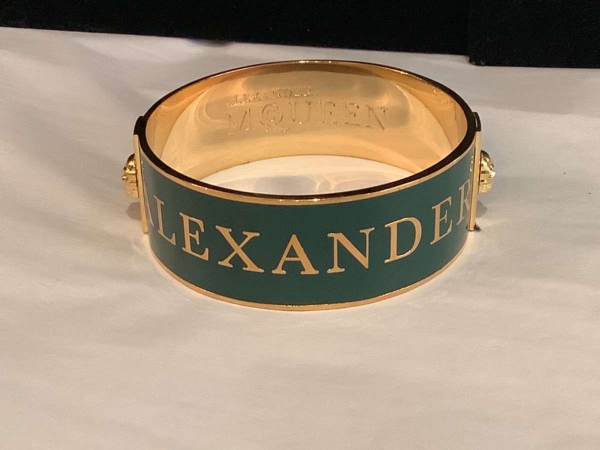 AUTHENTIC SIGN ALEXANDER McQUEEN GREEN ENAMEL & GOLD TONE SKULL