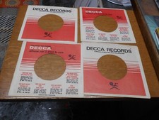 45 RECORD SLEEVES. LOT OF FOUR DECCA, DATED ON SIDE. 2-66.