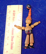 antique wood jointed clown