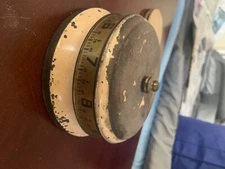 Lux mystery Rotary tape measure clock