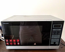 Sharp R-242 25L 800W Countertop Microwave Defrost LED Display Silver/Black