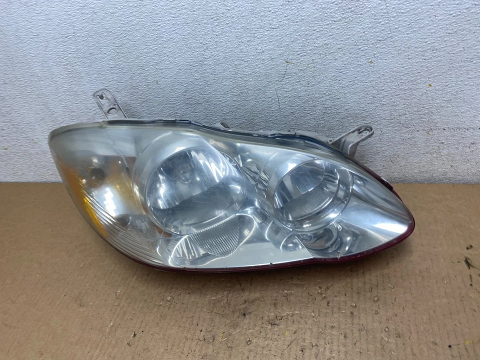 Faro lateral derecho Toyota Corolla 2005 a 2008 pasajero OEM L8621 DW Foto 2 de 4