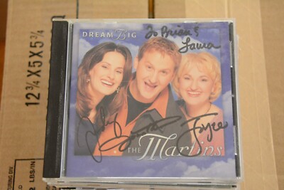 *DISC IS BADLY SCRATCHED* APPEARS SIGNED ''THE MARTINS DREAM BIG'' CD