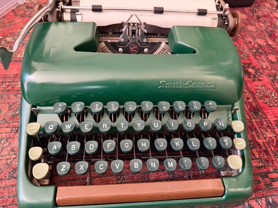 A 1954 Smith-Corona Silent Super in forest army green — serviced, clean, and dripping in Cold War-era cool with a color that almost no modern object pulls off.