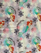Disney Princess Fabric Ariel Watercolor Little Mermaid purple sold by 1/2 yard