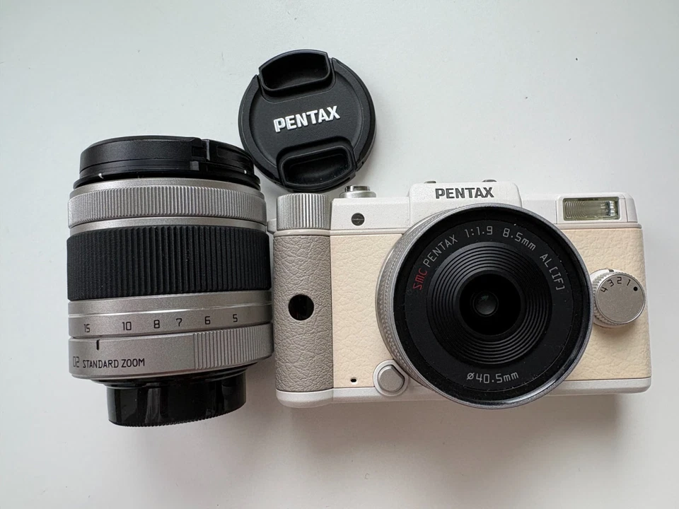 Pentax Q10, Weiß, 12.4 MP, Set mit O1 8.5mm/1.9 und O2 5-15mm/2.8-4.5 - Bild 2 von 4