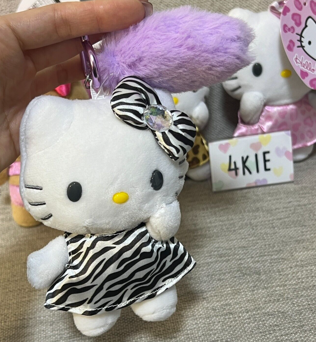 hello kitty mascot keychain White × Zebra With fluffy tail charm