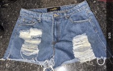Indigo Rein distressed mid rise denim shorts. Size 9/28.