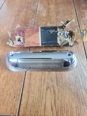 Number Plate Chrome Surround & Plastic Lens Lucas L696 Used - Image 1 of 4