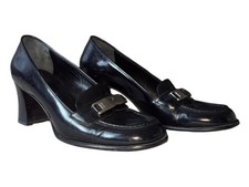 Prada black, leather heeled loafers with silver buckle. women size 39 women
