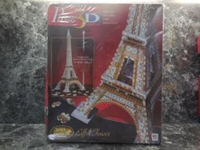 milton bradley 300 piece 3d puzzle of the eiffel tower new never opened