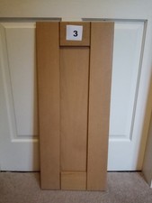 One matching pair of Howden Kitchen Cabinet Doors in Oak wood 298mm wide