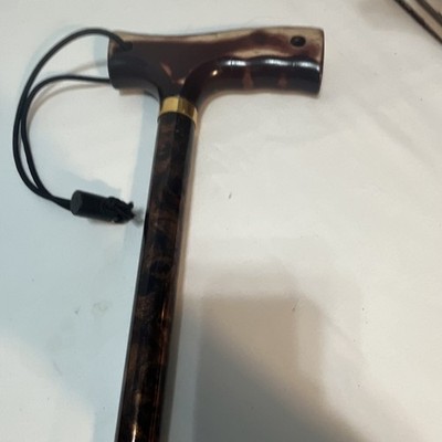 Brown Adjustable Height Lightweight Walking Cane with Wrist Strap. Adj. to 40 .