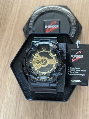 Casio G-SHOCK Armbanduhr Analog/Digital schwarz-gold stoßfest 200 m Box