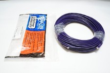 Tripp Lite 150-ft. Cat6 Gigabit Snagless Molded Patch Cable RJ45 M/M - Purple