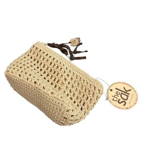 The Sak Hand-Crocheted Cosmetic Bag Beige Bronze Metallic Tassel Pouch NEW