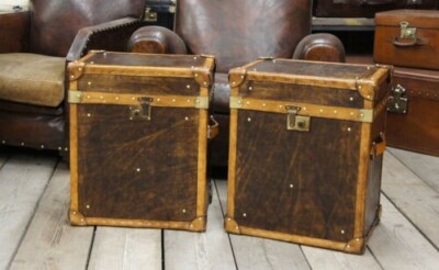 Handmade matching pair of antique leather finished occasional side table trunks