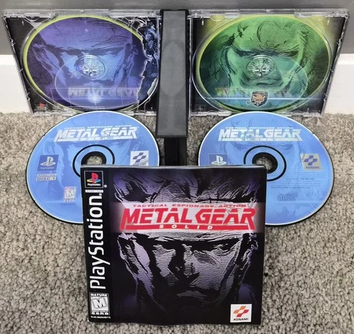 Konami Metal Gear Solid Complete Manual 2 Discs Sony PlayStation 1 1998