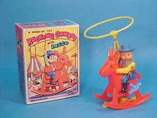 VINTAGE ROCKING COWBOY WITH LASSO WIND UP TIN  LASTIC TOY BOXED BOXED HONG KONG