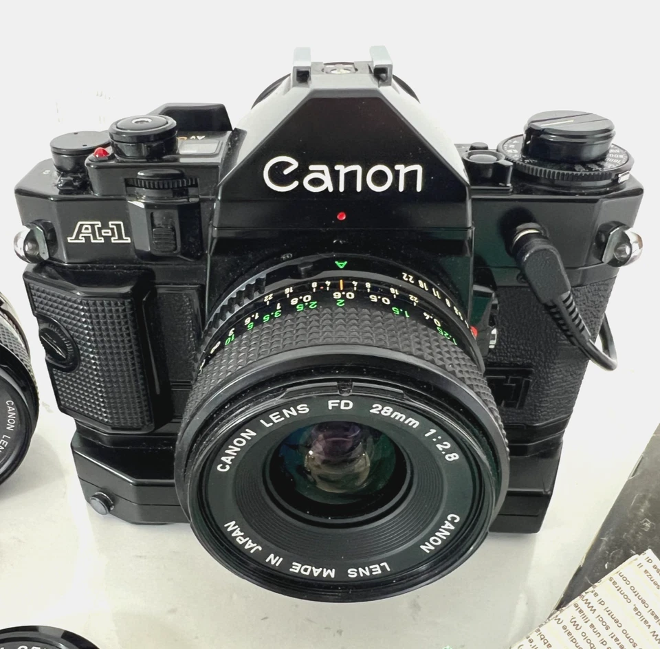 Cámara fotográfica Canon A-1 negra 35 mm FD 28 mm f2,8 lente con 50 mm 1:1,4 | Paquete Foto 4 de 4