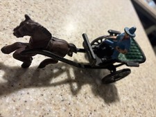 Cast Iron Horse Drawn Buggy. With Man On Buggy.