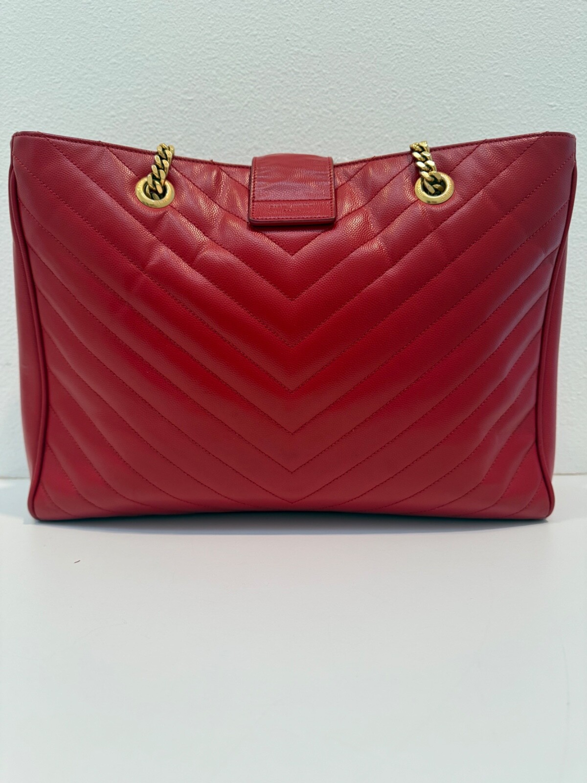 Borsa Cassandra YVES SAINT LAURENT rossa trapuntata pelle grana monogramma catena