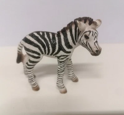 Figurine Schleich, bébé zèbre, animaux de la savane - Photo 1/4