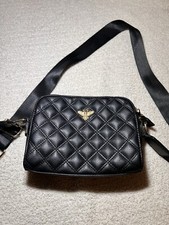Black Quilted Crossbody Bag with Gold Bee Emblem   Stylish  Practical