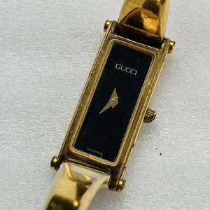 Montre Bracelet Femme GUCCI Or Noir 1500L Mouvement Quartz Boîtier Rectangulaire Élégant