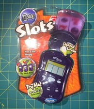 Fliptop Slots Classic Radica Mattel Handheld Electronic Game Purple NIB