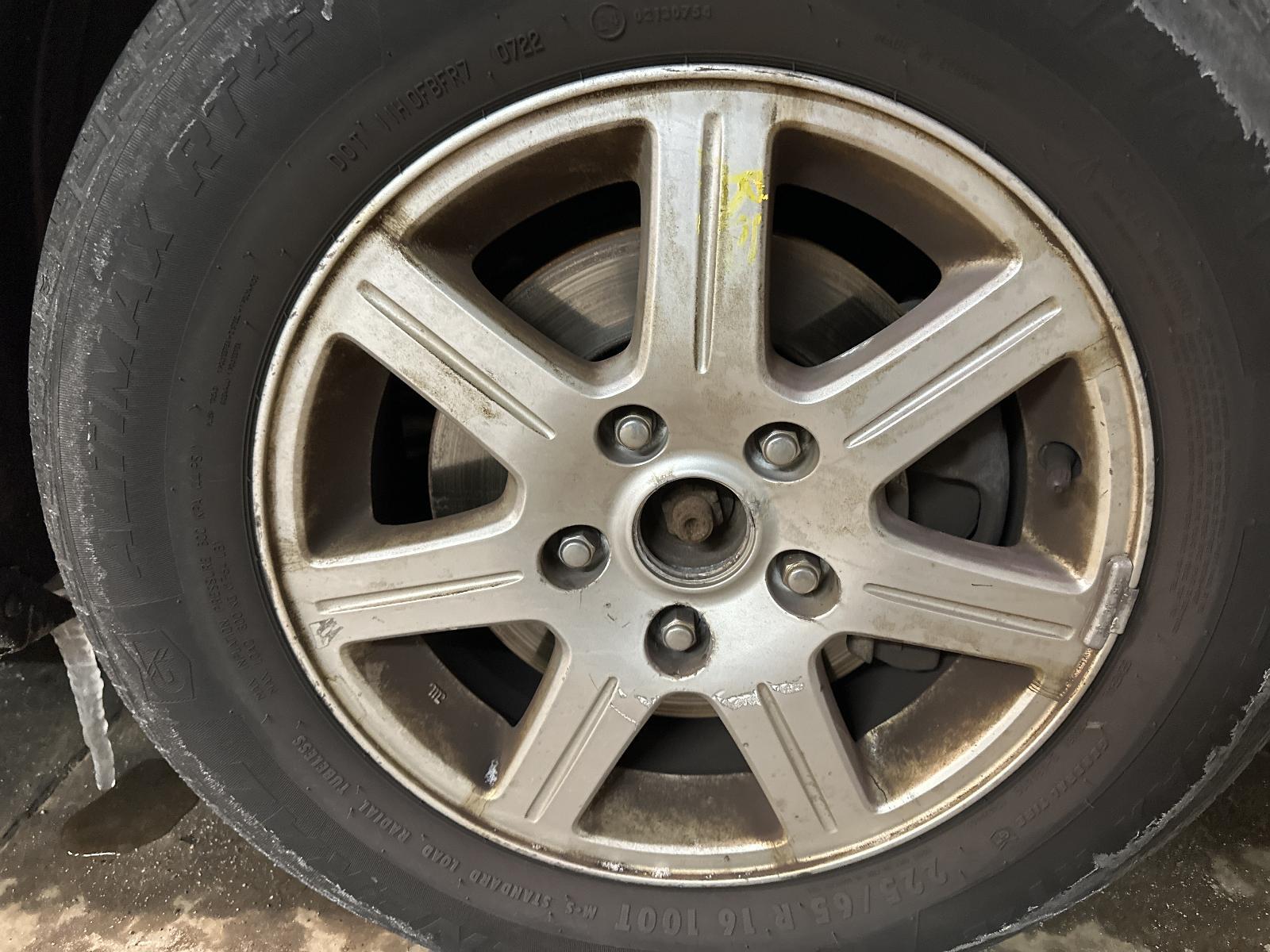 Used Wheel fits: 2013 Chrysler Town & country 16x6-1/2 aluminum 7 spoke painted