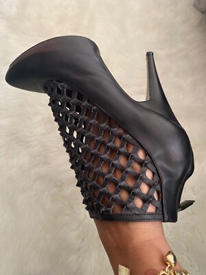 Black Leather Givenchy Bootie size 41. Worn once, minor markings, dust bag avail