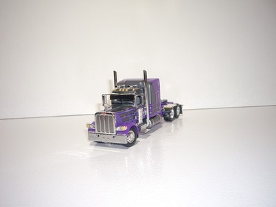 DCP FIRST GEAR 1/64 PURPLE AND GRAY PETERBILT 389 WITH 63'' SLEEPER