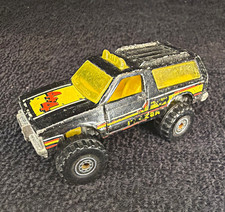Hot Wheels Chevrolet Blazer 4x4 1:64 Diecast SUV Black/Yellow/Red 1983