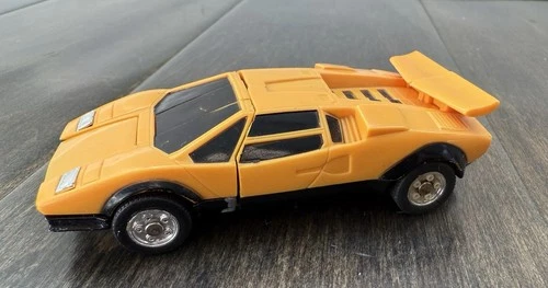 GoBots Pocket Puzzler Yellow Lamborghini Countach Tonka Bandai 1984 Loose Joints