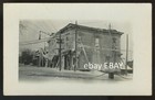 1915 circa. Small town old building ice storm or fire. PEOPLE walking # 7  RPPC — photo 1