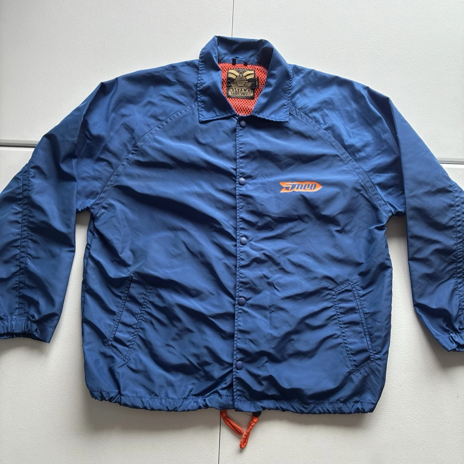 Jnco Jeans Bomb Squad Army Twill Jacket XL Blue Orange Made In USA Back Graphic
Opens in a new windo