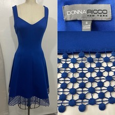 Donna Ricco Size 6 blue fit n flair stretch dress. Lace at hem