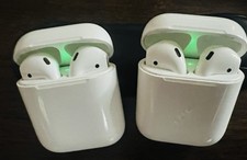 Two Apple AirPods 1st Generation In-Ear Headsets with Charging Cases tested