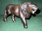 Vintage Hand Carved Wooden African Lion in Dark Wood 7-1/2" Long  x 4-1/2" Tall