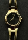 Vintage New 1994 SEIKO Women's 20mm Quartz Watch Gold Case Bracelet Black Dial
