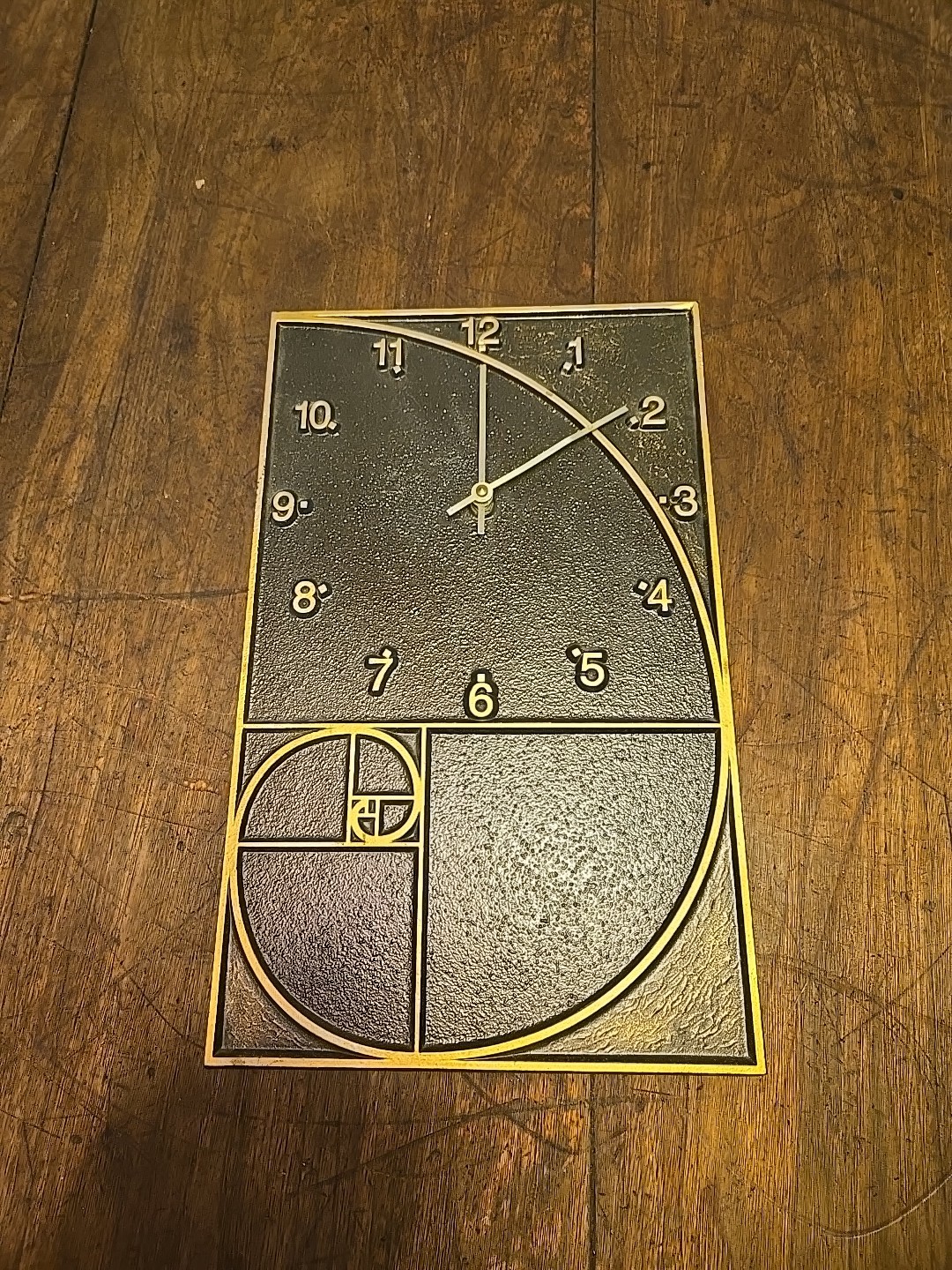 Whitehall Products Bronze Wall Clock Golden ratio.fibonacci