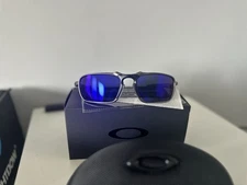 Oakley Badman Metal Black Frame Polarized Blue Lens Sunglasses