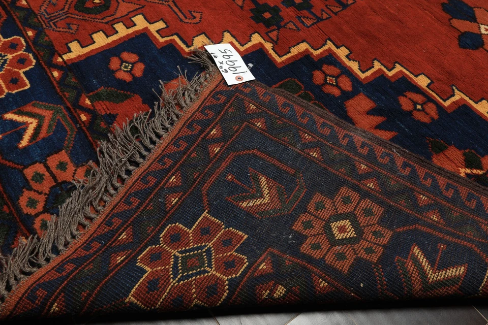 Alfombra geométrica tradicional Herizz de lana anudada a mano de 6'9''x9'7"" Foto 3 de 4