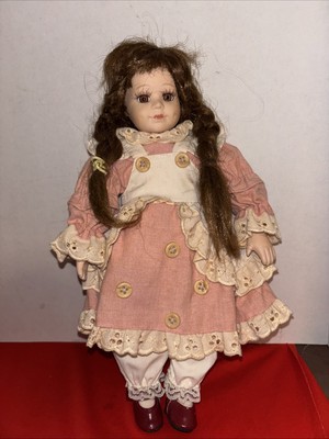 Geppeddo Porcelain Doll 11.5  Tall- Hair Needs Attention- Good Conditions