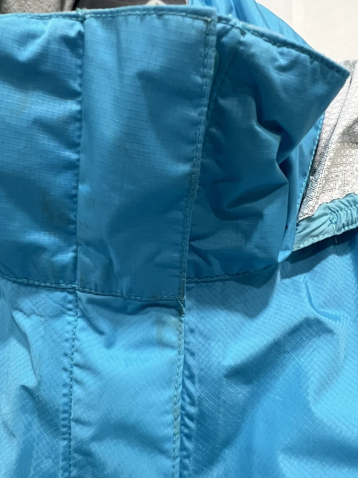 Chaqueta cortavientos de lluvia Marmot para niñas talla grande verde azulado turquesa nailon con capucha Foto 4 de 4