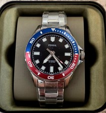 Fossil Silver Watch with Black Dial and Red-Blue Bezel