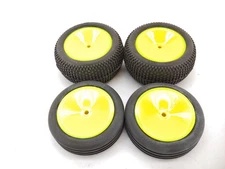 Proline Blockade Rear & 4-Rib Front Buggy Tires on Jconcepts Yellow Wheels 12mm